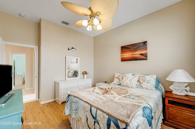 274 Clyde St, Melbourne Beach, FL 32951 - bedroom with light wood-style flooring, a ceiling fan, and baseboards