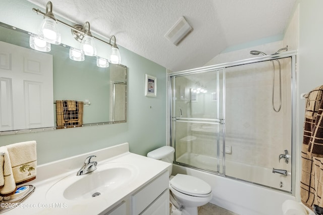 274 Clyde St, Melbourne Beach, FL 32951 - full bathroom featuring vanity, toilet, bath / shower combo with glass door, and a textured ceiling