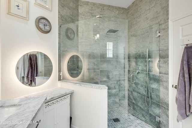 274 Clyde St, Melbourne Beach, FL 32951 - bathroom featuring a stall shower and vanity