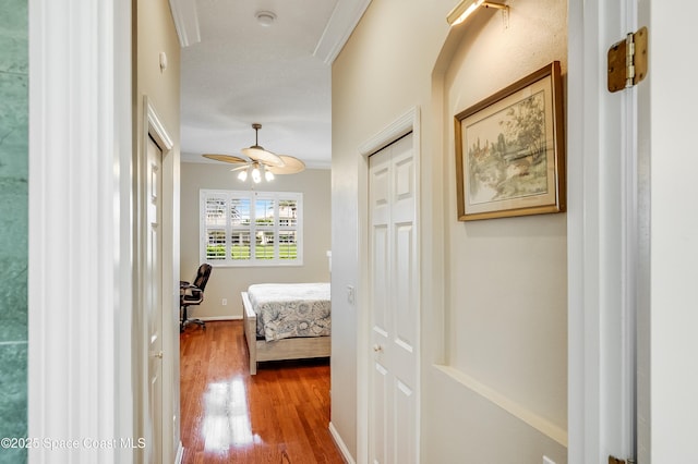 274 Clyde St, Melbourne Beach, FL 32951 - hallway featuring wood finished floors and baseboards