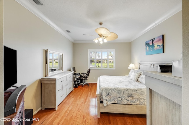 274 Clyde St, Melbourne Beach, FL 32951 - bedroom with ornamental molding, an office area, light wood-style flooring, and baseboards