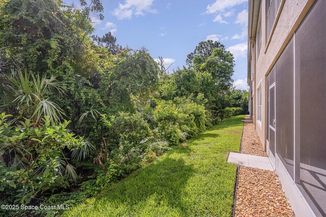 401 Trotter Ln Unit 103, Melbourne, FL 32940 - view of green lawn