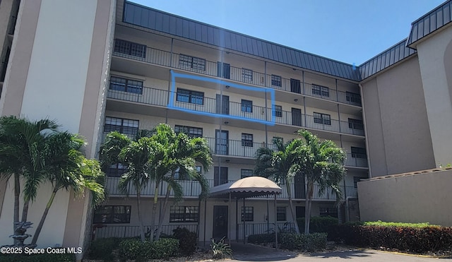 4100 Ocean Beach Blvd Unit 412, Cocoa Beach, FL 32931 - view of apartment building / complex