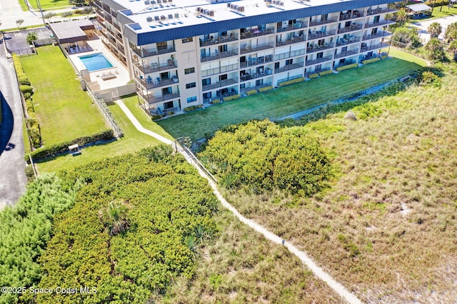 4100 Ocean Beach Blvd Unit 412, Cocoa Beach, FL 32931 - bird's eye view of a pool area and apartment complex / building