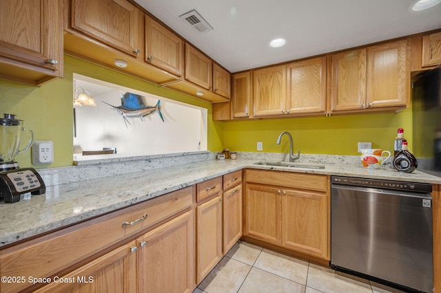 4100 Ocean Beach Blvd Unit 412, Cocoa Beach, FL 32931 - kitchen with stainless steel dishwasher, a sink, light tile patterned floors, light stone counters, and recessed lighting
