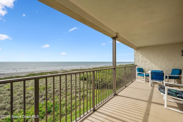 4100 Ocean Beach Blvd Unit 412, Cocoa Beach, FL 32931 - balcony featuring view of water and beach