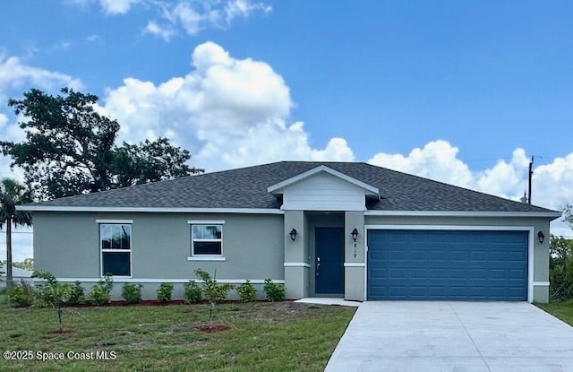 1819 Red Bud Cir NW Unit 41, Palm Bay, FL 32907 - ranch-style house featuring an attached garage, driveway, stucco siding, and a front yard