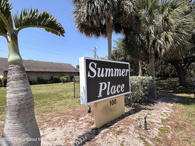 225 Spring Dr Unit 3, Merritt Island, FL 32953 - community / neighborhood sign featuring a lawn