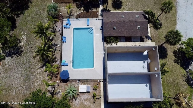 225 Spring Dr Unit 3, Merritt Island, FL 32953 - view from above of property featuring a pool