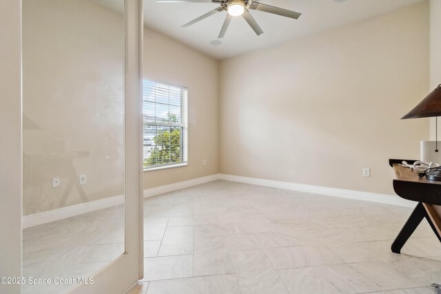 2262 Lune Ct, West Melbourne, FL 32904 - unfurnished office with a ceiling fan, light marble finish flooring, and baseboards
