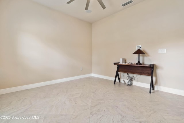 2262 Lune Ct, West Melbourne, FL 32904 - spare room featuring a ceiling fan and baseboards