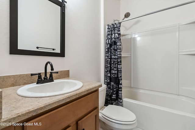 2262 Lune Ct, West Melbourne, FL 32904 - full bathroom with vanity, toilet, and shower / bath combo with shower curtain