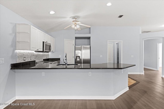 3817 Sunbeam Ct, Merritt Island, FL 32953 - kitchen featuring stainless steel appliances, a sink, open shelves, a peninsula, and ceiling fan