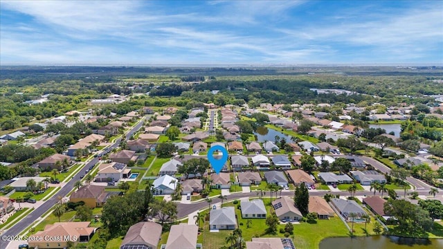 3817 Sunbeam Ct, Merritt Island, FL 32953 - aerial overview of property's location featuring nearby suburban area and a nearby body of water