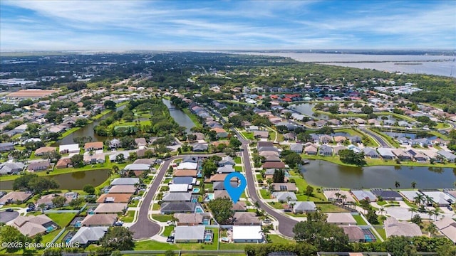 3817 Sunbeam Ct, Merritt Island, FL 32953 - aerial overview of property's location with a large body of water and nearby suburban area