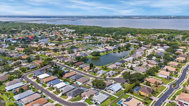 3817 Sunbeam Ct, Merritt Island, FL 32953 - aerial view of property and surrounding area featuring a large body of water and nearby suburban area