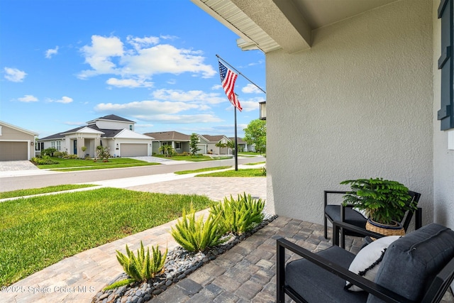 2376 Kamin Dr, Melbourne, FL 32940 - view of patio featuring a residential view