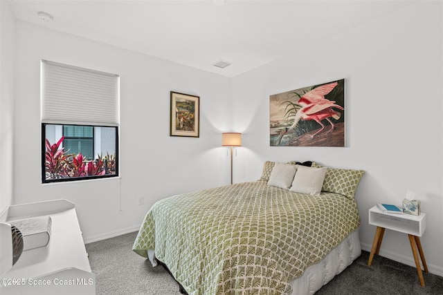 2376 Kamin Dr, Melbourne, FL 32940 - bedroom featuring carpet floors and baseboards