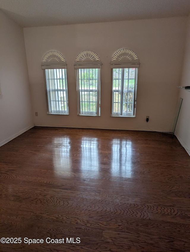 862 Aachen Ave NW, Palm Bay, FL 32907 - unfurnished room featuring wood finished floors and baseboards