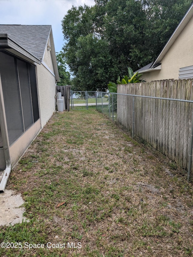 862 Aachen Ave NW, Palm Bay, FL 32907 - view of yard with a gate