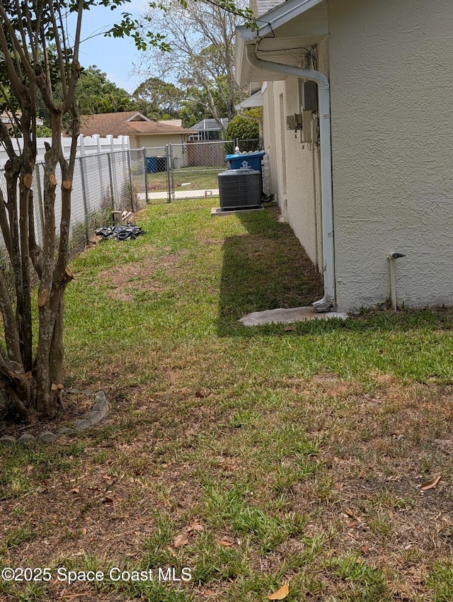 862 Aachen Ave NW, Palm Bay, FL 32907 - view of yard with central AC unit