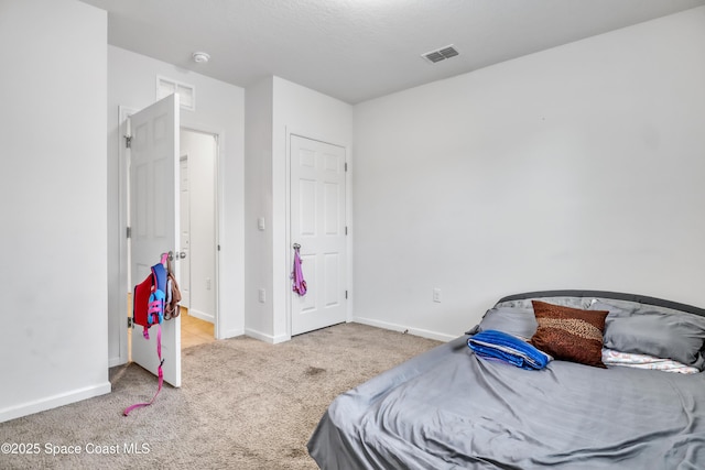 1005 Slocum St NW, Palm Bay, FL 32907 - bedroom with carpet flooring and baseboards