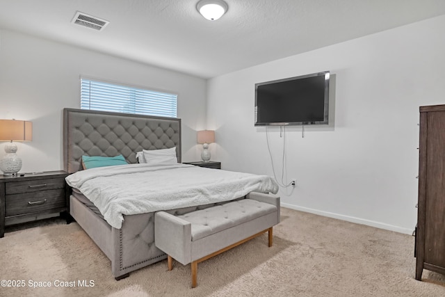 1005 Slocum St NW, Palm Bay, FL 32907 - bedroom with baseboards and light colored carpet