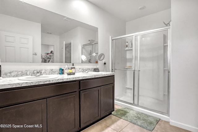 1005 Slocum St NW, Palm Bay, FL 32907 - full bath featuring tile patterned floors, a shower stall, and double vanity
