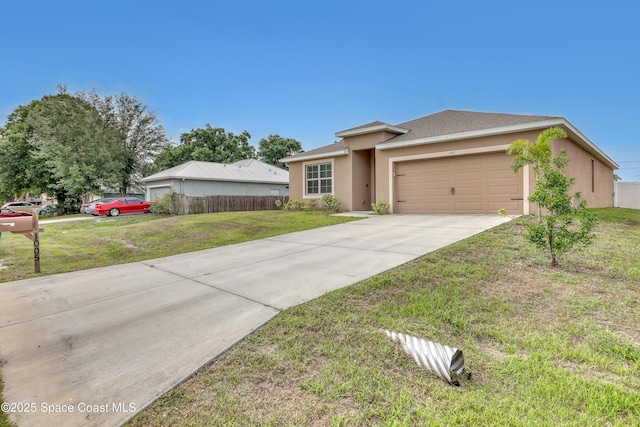 1005 Slocum St NW, Palm Bay, FL 32907 - view of front of house with a garage, driveway, and stucco siding