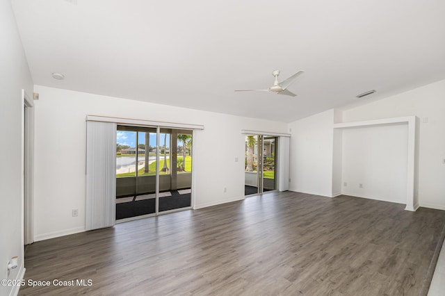 1555 Knoll Ridge Dr, Melbourne, FL 32940 - spare room featuring a ceiling fan, lofted ceiling, wood finished floors, and baseboards