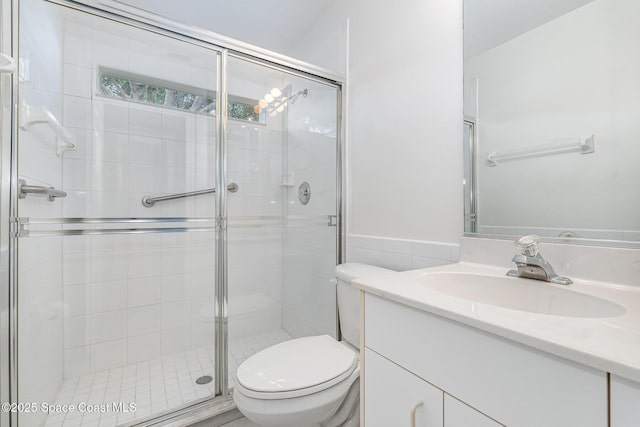 1555 Knoll Ridge Dr, Melbourne, FL 32940 - bathroom featuring vanity, a shower stall, and toilet