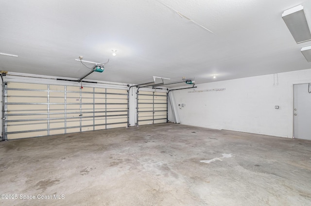 1555 Knoll Ridge Dr, Melbourne, FL 32940 - garage featuring a garage door opener