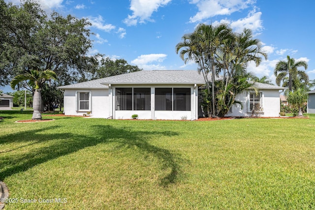 1555 Knoll Ridge Dr, Melbourne, FL 32940 - back of property with a lawn, a sunroom, and stucco siding