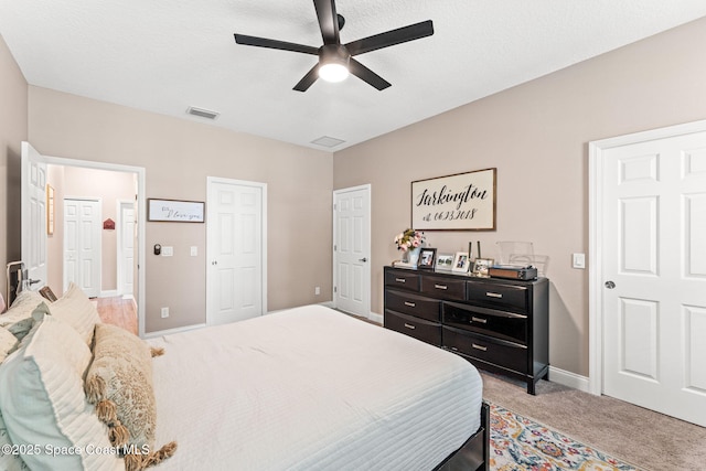 1641 Earlham Ave NW, Palm Bay, FL 32907 - bedroom with light colored carpet, baseboards, and a ceiling fan