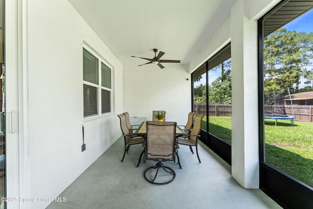 1641 Earlham Ave NW, Palm Bay, FL 32907 - sunroom with a ceiling fan, outdoor dining space, and healthy amount of natural light