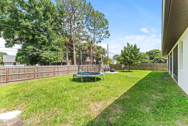 1641 Earlham Ave NW, Palm Bay, FL 32907 - view of yard featuring a trampoline