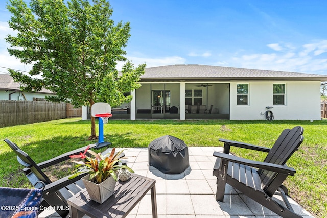1641 Earlham Ave NW, Palm Bay, FL 32907 - back of property featuring a patio area, stucco siding, and ceiling fan