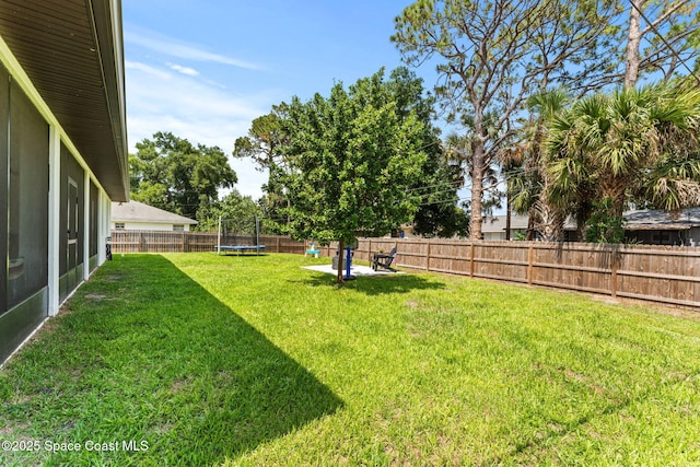 1641 Earlham Ave NW, Palm Bay, FL 32907 - view of yard with a trampoline
