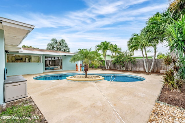 475 Park Ave, Satellite Beach, FL 32937 - view of swimming pool featuring a patio and a fenced backyard