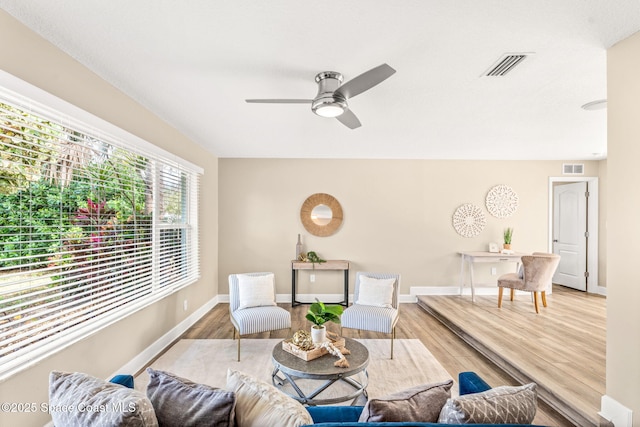 475 Park Ave, Satellite Beach, FL 32937 - living area featuring wood finished floors, ceiling fan, and baseboards