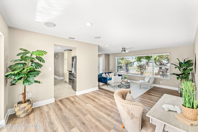 475 Park Ave, Satellite Beach, FL 32937 - living room featuring light wood-style flooring, ceiling fan, baseboards, and recessed lighting