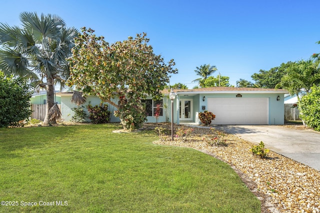 475 Park Ave, Satellite Beach, FL 32937 - view of front of house featuring stucco siding, driveway, and a garage