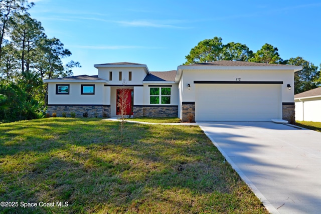 883 Parrotfish St SW, Palm Bay, FL 32908 - view of front facade with stone siding, stucco siding, and a garage