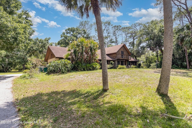 4121 Mustang Rd, Melbourne, FL 32934 - view of front of home with a front yard
