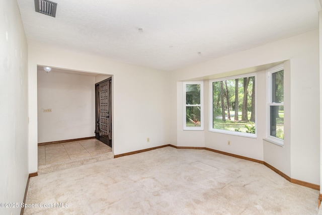 4121 Mustang Rd, Melbourne, FL 32934 - carpeted empty room featuring baseboards