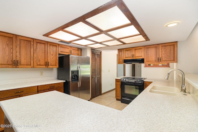 4121 Mustang Rd, Melbourne, FL 32934 - kitchen with stainless steel refrigerator with ice dispenser, under cabinet range hood, black electric range oven, a sink, and brown cabinetry