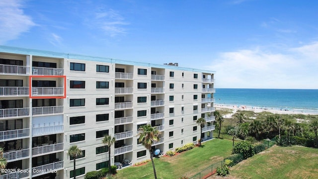 1000 N Atlantic Ave Unit 614, Cocoa Beach, FL 32931 - view of apartment building / complex with view of water and beach