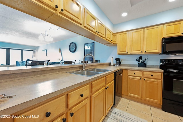 1000 N Atlantic Ave Unit 614, Cocoa Beach, FL 32931 - kitchen with black appliances, a sink, light tile patterned floors, light brown cabinets, and recessed lighting