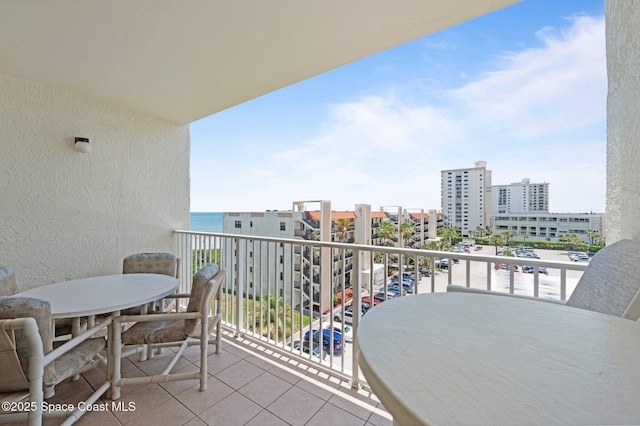 1000 N Atlantic Ave Unit 614, Cocoa Beach, FL 32931 - balcony with outdoor dining space