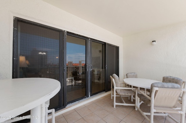 1000 N Atlantic Ave Unit 614, Cocoa Beach, FL 32931 - balcony featuring outdoor dining space